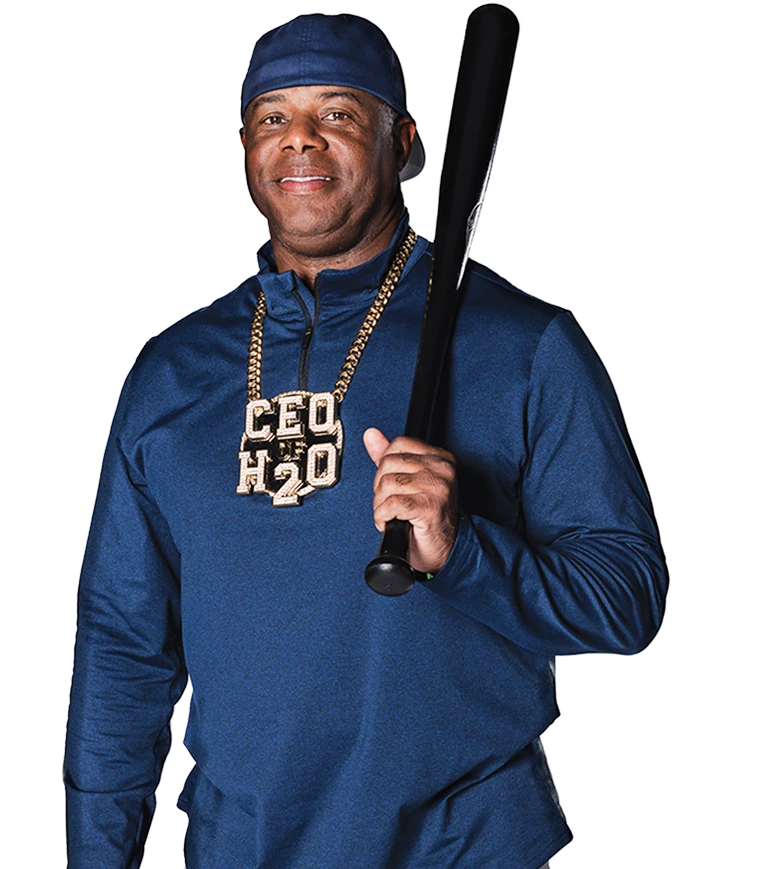 Ken Griffey Jr.  in a blue outfit holding a black baseball bat, wearing a large "CEO H20" chain necklace.