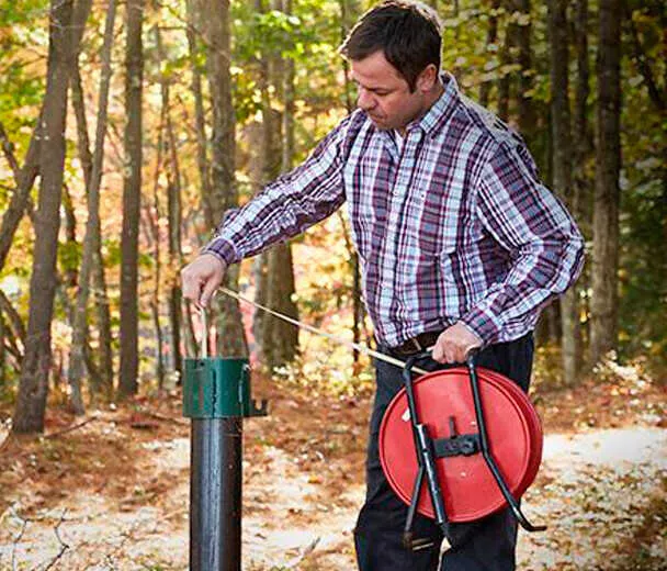 A Poland Spring Natural Resource Manager monitors our spring source.